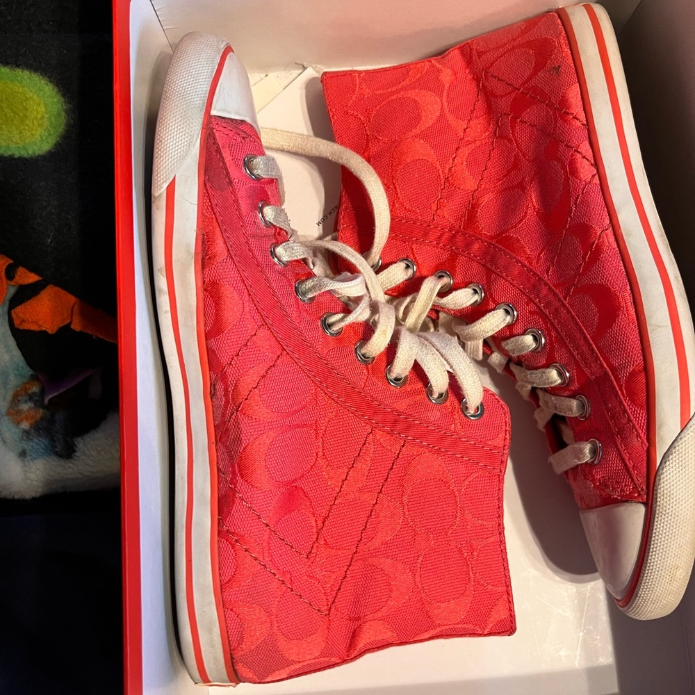 Pink high top coach shoes